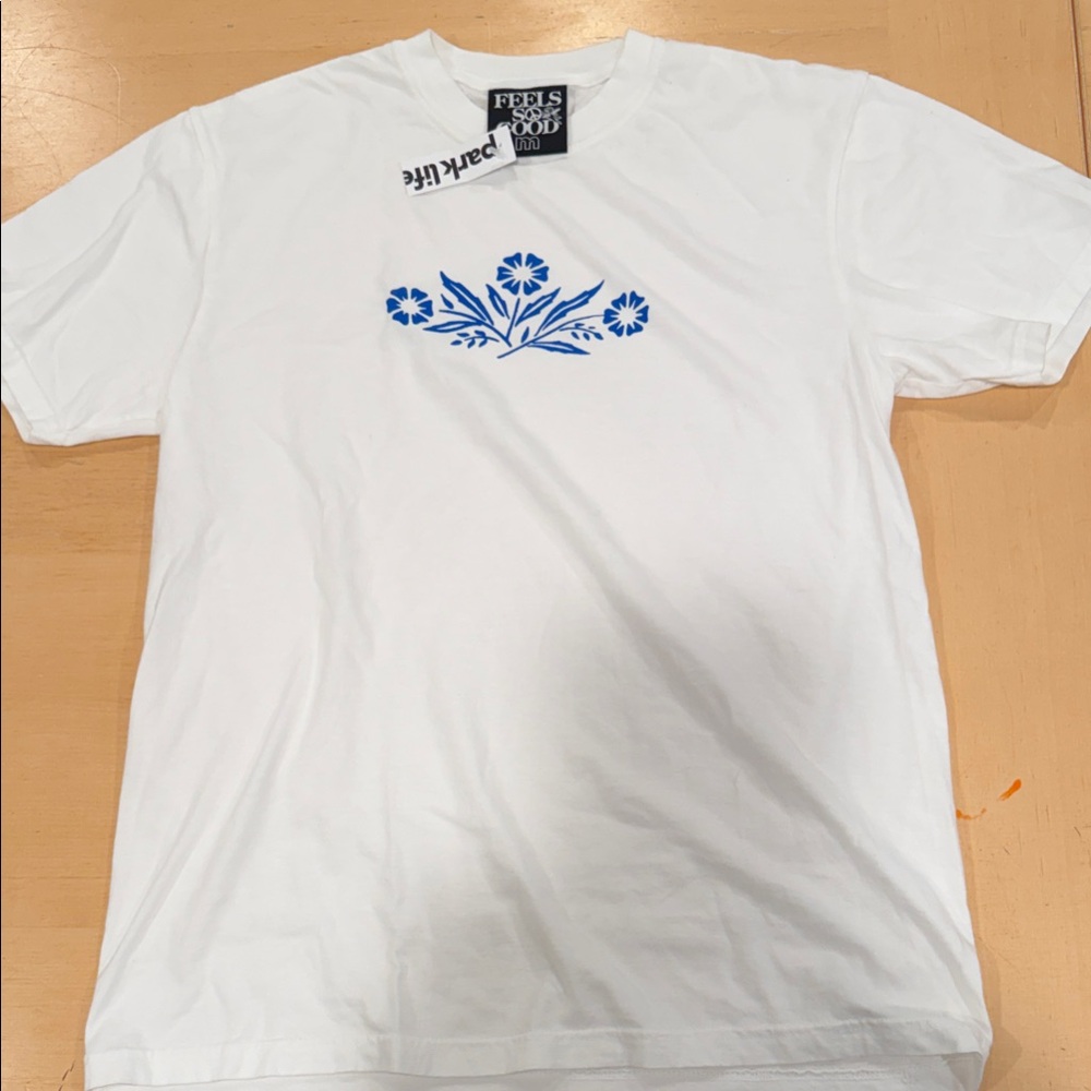 Feels So Good White Short Sleeve Tee with Blue Floral Graphic